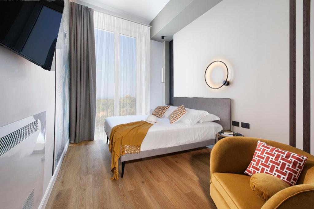 Postel nebo postele na pokoji v ubytování Vesuvius Palace Aparthotel