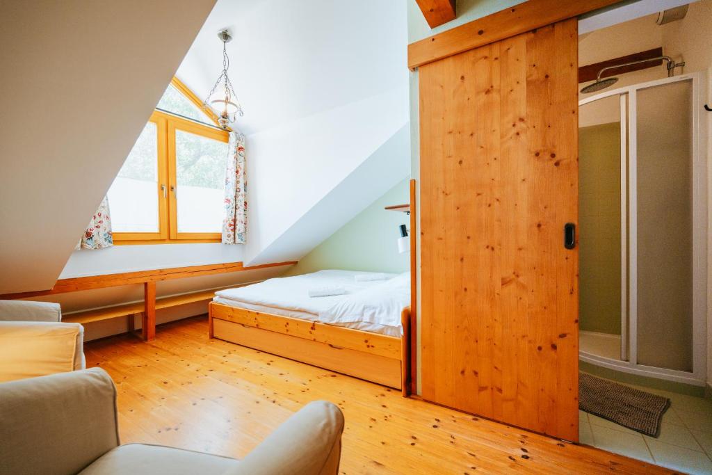 Postel nebo postele na pokoji v ubytování Penzion U maléřa