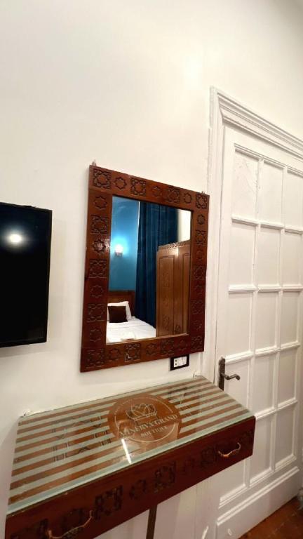TV a/nebo společenská místnost v ubytování Minerva Grand Hostel Cairo