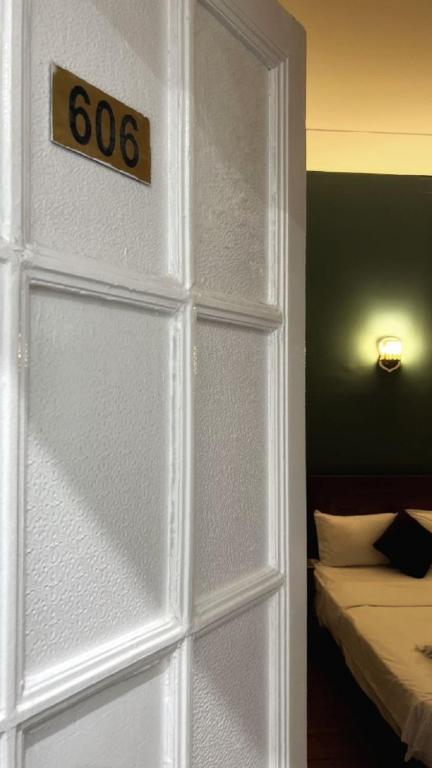 Postel nebo postele na pokoji v ubytování Minerva Grand Hostel Cairo