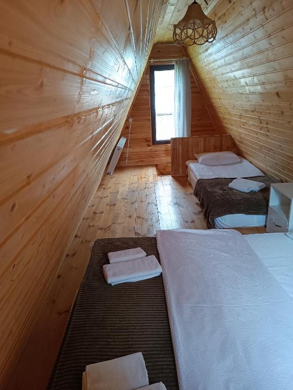 Postel nebo postele na pokoji v ubytování Cottage Natali