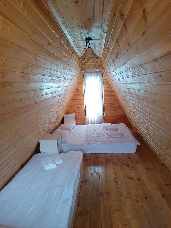 Postel nebo postele na pokoji v ubytování Cottage Natali