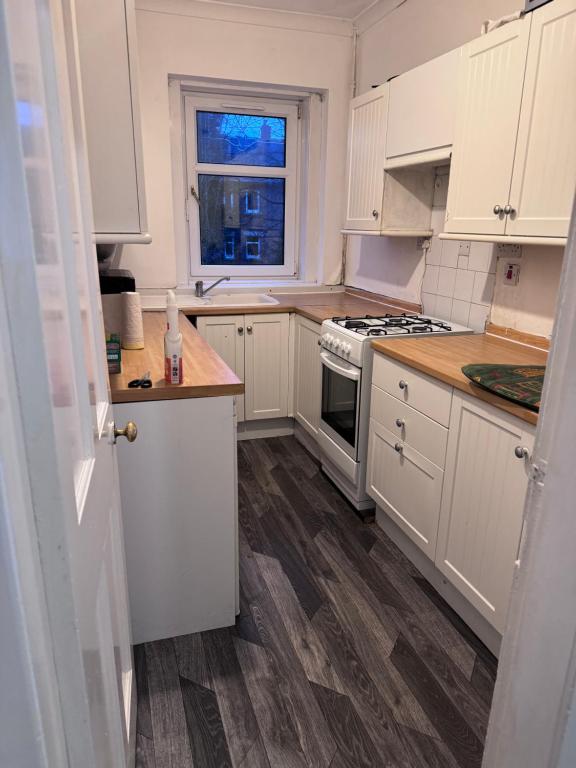 Kuchyň nebo kuchyňský kout v ubytování JJ Apartments