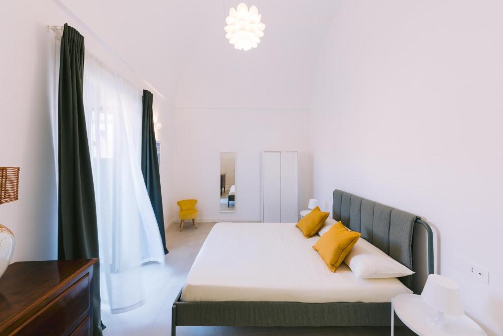Letto o letti in una camera di Casa Don Matteo