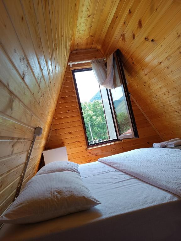 Postel nebo postele na pokoji v ubytování Cottage Natali