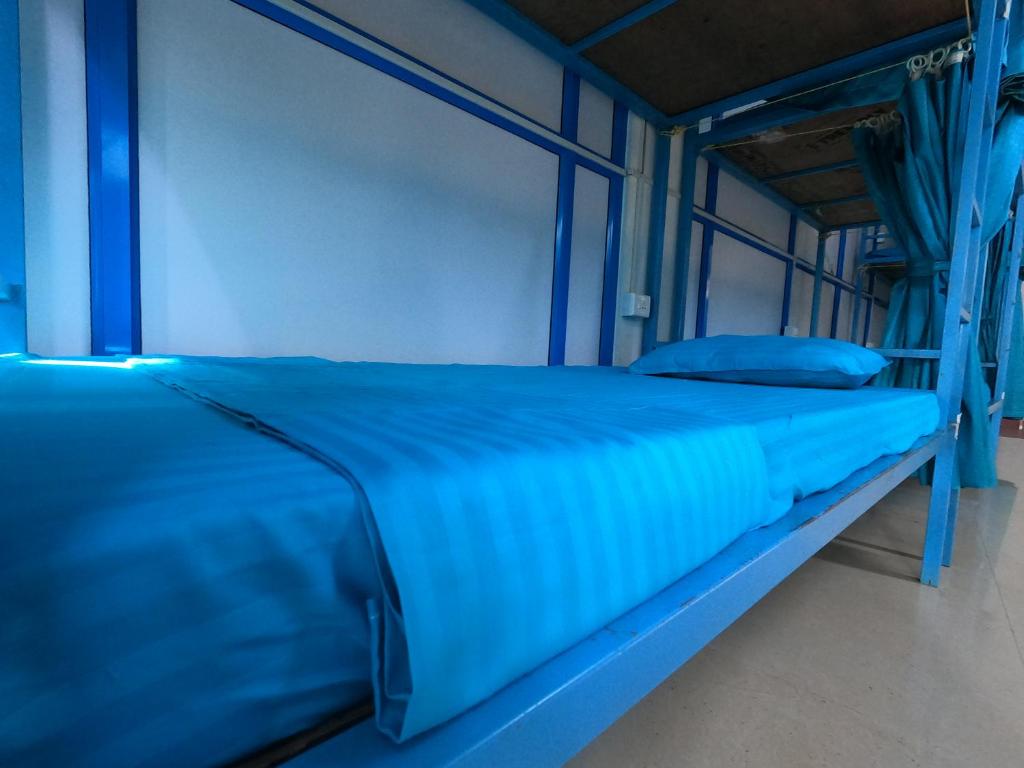 Postel nebo postele na pokoji v ubytování Soul Hostels, Varkala - Black Beach