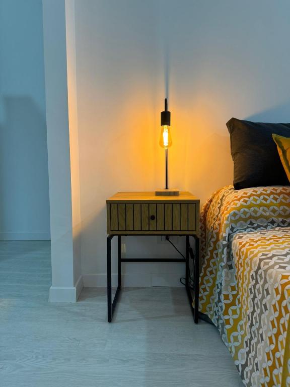 Postel nebo postele na pokoji v ubytování Avi Rooms