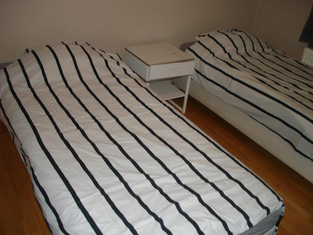 Postel nebo postele na pokoji v ubytování Appartement Courcelles