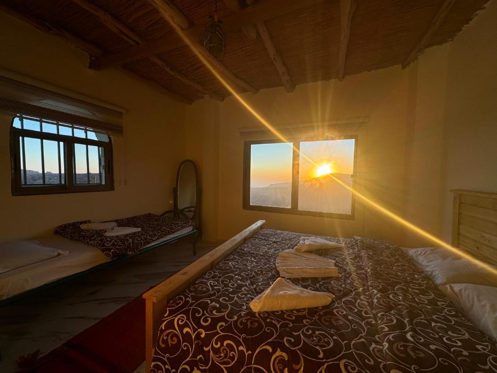 Postel nebo postele na pokoji v ubytování Dana Tower Hotel