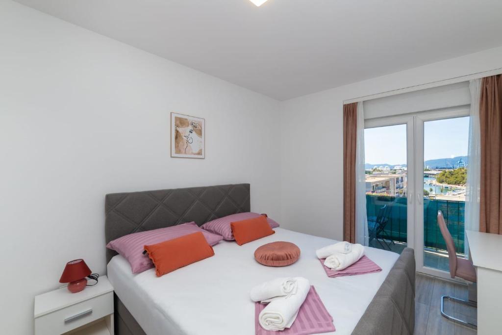 Ένα ή περισσότερα κρεβάτια σε δωμάτιο στο Apartman Angy