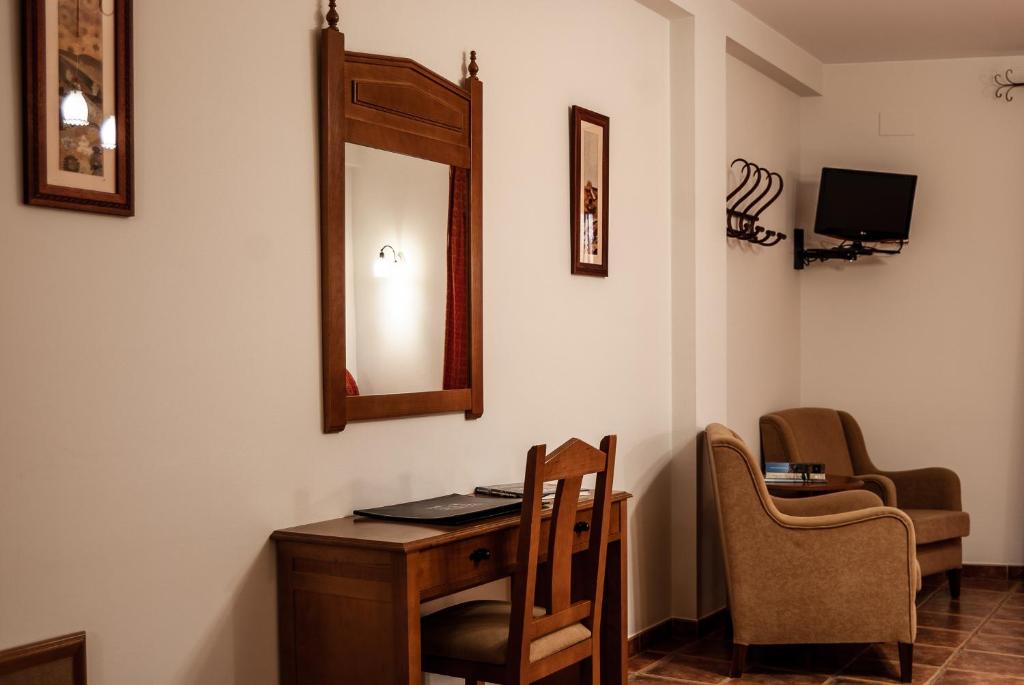TV a/nebo společenská místnost v ubytování Hotel La Fragua II