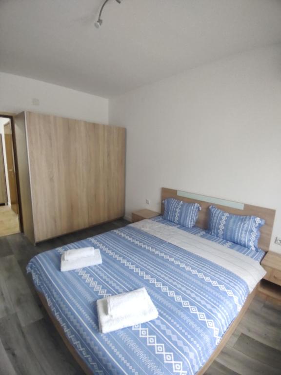 Postel nebo postele na pokoji v ubytování Apartment Kiril