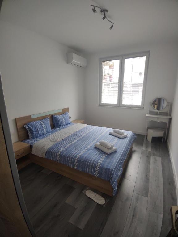 Postel nebo postele na pokoji v ubytování Apartment Kiril