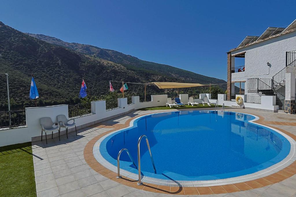 Bazén v ubytování Hotel La Fragua II nebo v jeho okolí
