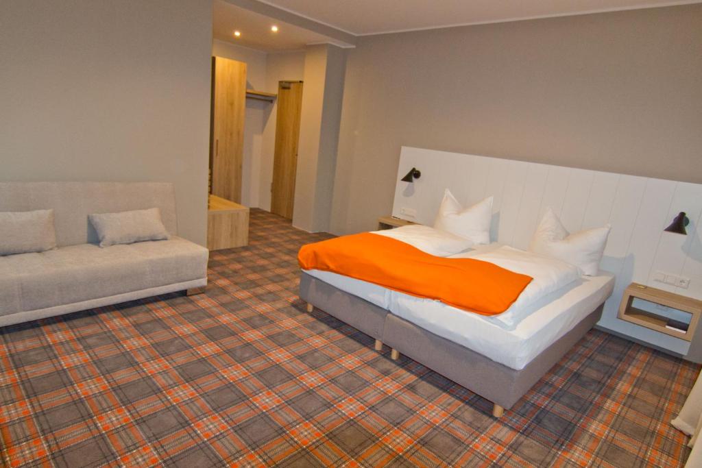 Posezení v ubytování Hotel Alpha