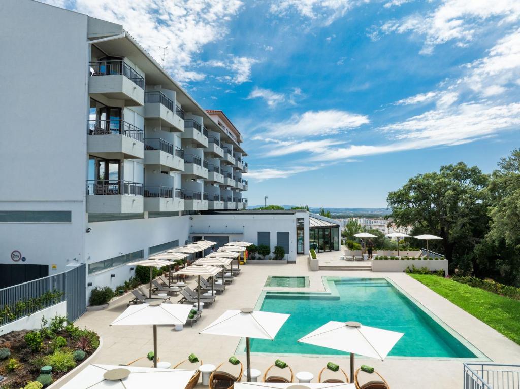Bazén v ubytování Meliá Castelo Branco nebo v jeho okolí