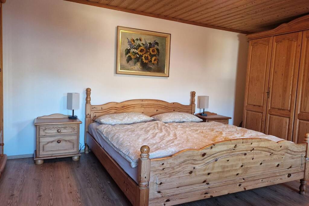 Postel nebo postele na pokoji v ubytování Ferienhaus Beringer am Kallbach