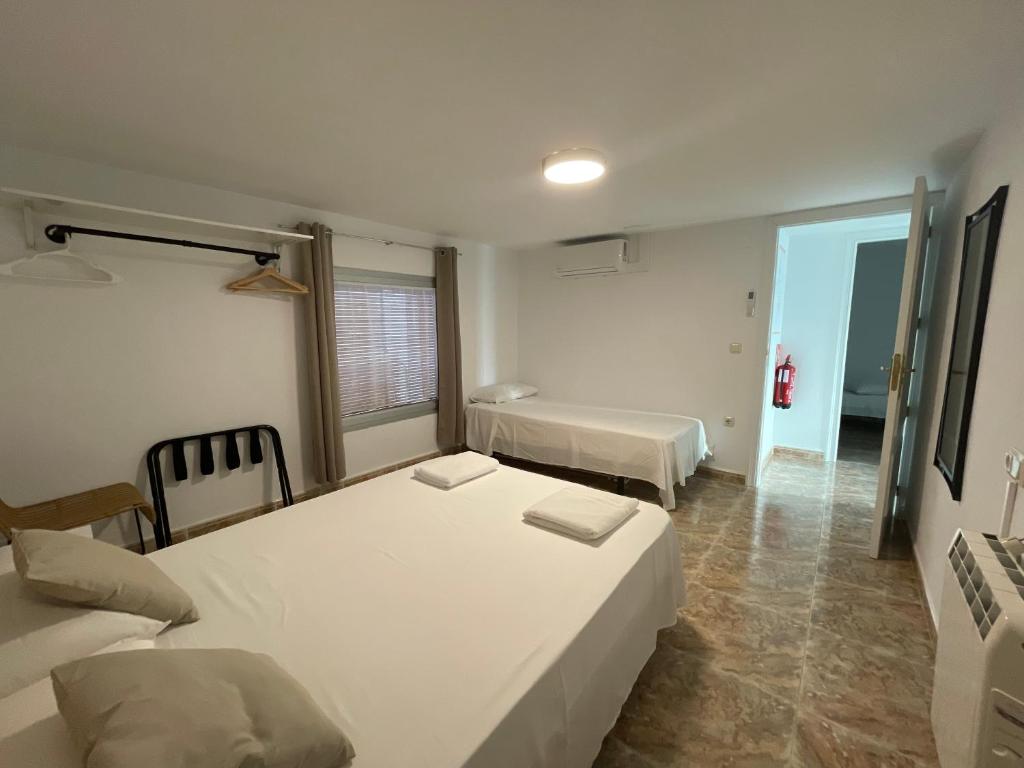 Posteľ alebo postele v izbe v ubytovaní Casa Rural Berta