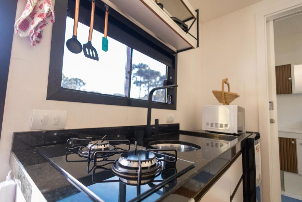 Kuchyň nebo kuchyňský kout v ubytování Cabanas Loft Paraíso