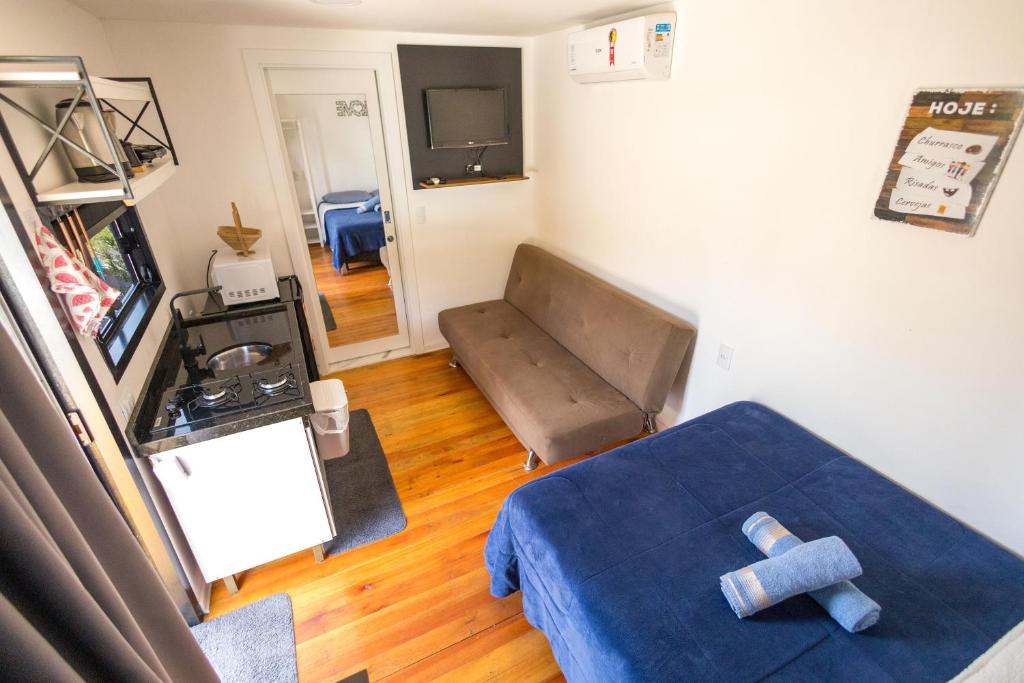 TV a/nebo společenská místnost v ubytování Cabanas Loft Paraíso