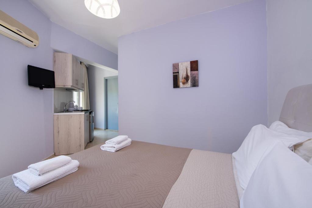 Posteľ alebo postele v izbe v ubytovaní Labyrinth Hotel