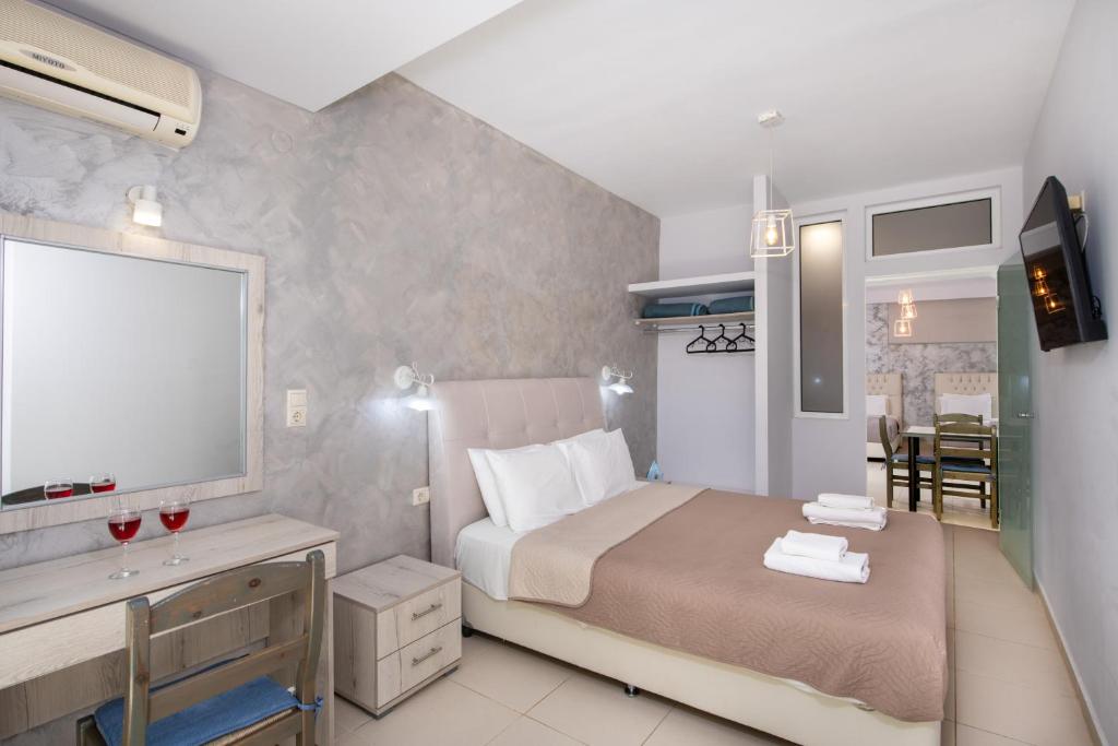 Posteľ alebo postele v izbe v ubytovaní Labyrinth Hotel