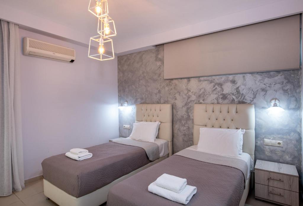Posteľ alebo postele v izbe v ubytovaní Labyrinth Hotel