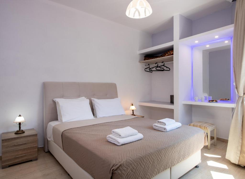 Posteľ alebo postele v izbe v ubytovaní Labyrinth Hotel