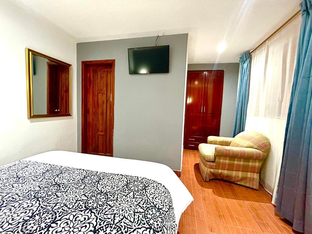Postel nebo postele na pokoji v ubytování ACCEL Hotel La Quinta