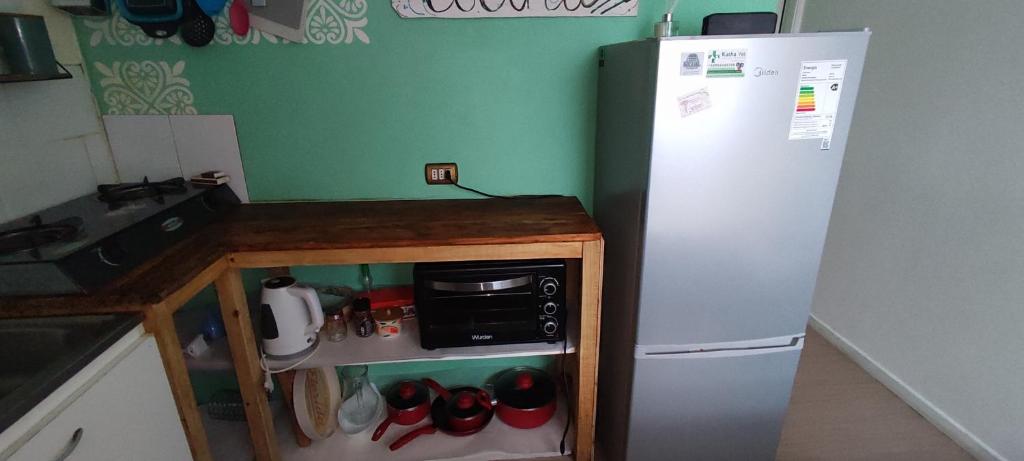 Kuchyň nebo kuchyňský kout v ubytování Cabaña YaPide, 2 Dormitorios, Centrica