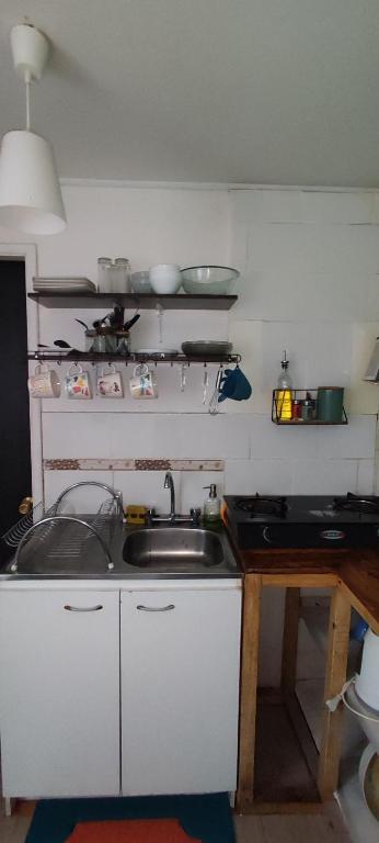 Kuchyň nebo kuchyňský kout v ubytování Cabaña YaPide, 2 Dormitorios, Centrica