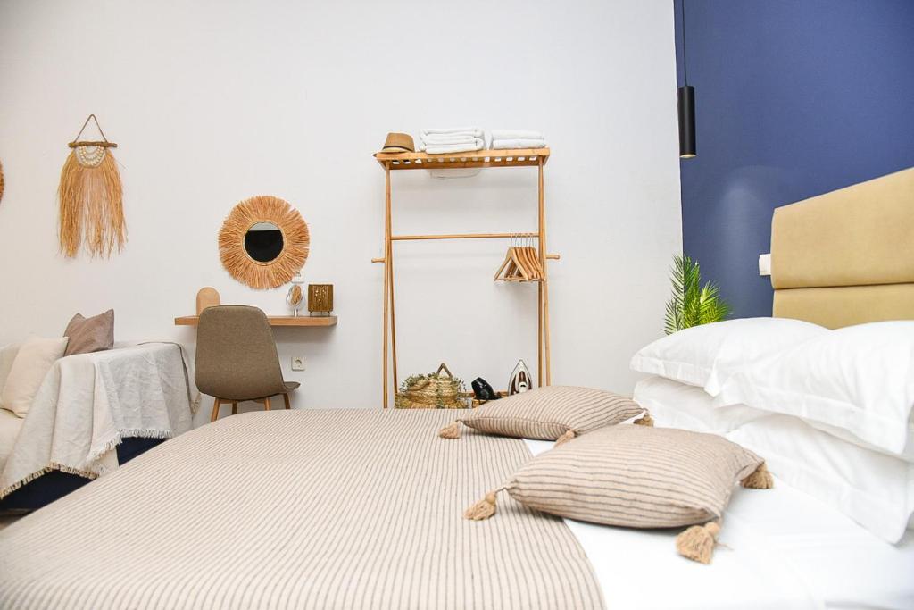 Postel nebo postele na pokoji v ubytování OASIS RESIDENCE