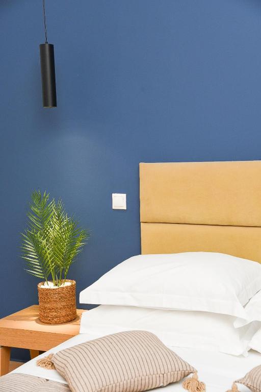 Postel nebo postele na pokoji v ubytování OASIS RESIDENCE
