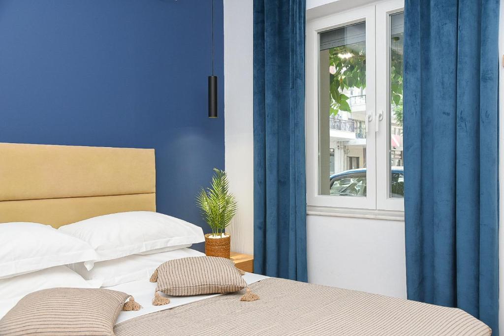 Postel nebo postele na pokoji v ubytování OASIS RESIDENCE