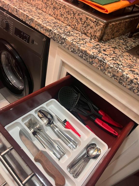Kuchyň nebo kuchyňský kout v ubytování Appartement confortable neuf