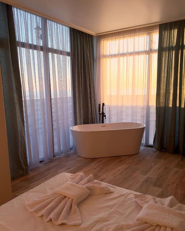 Koupelna v ubytování RUMI Hotel