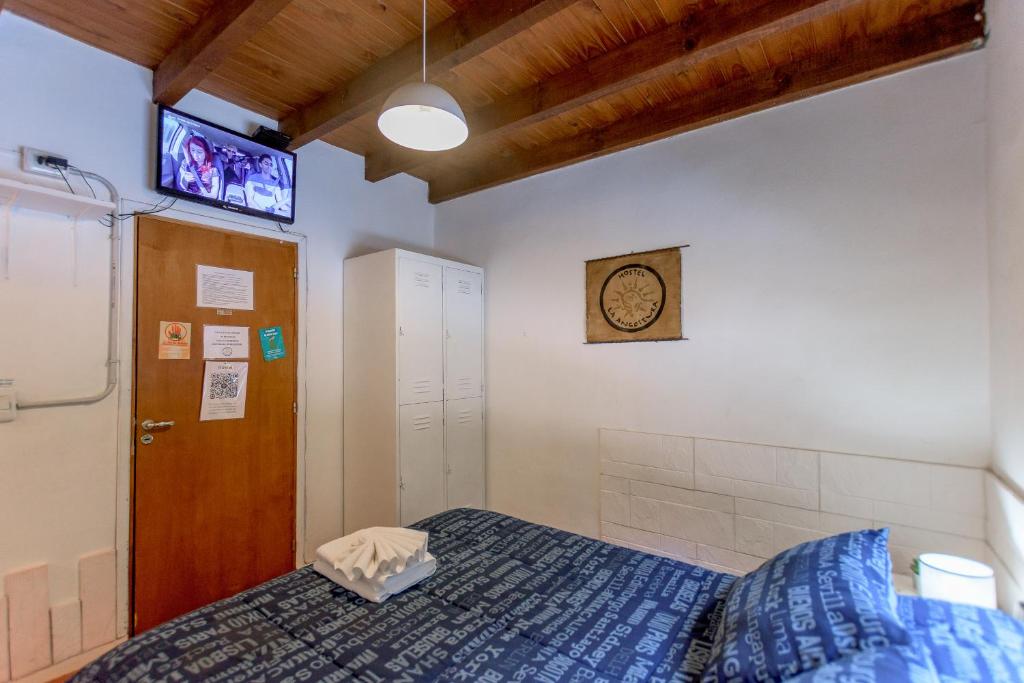 Postel nebo postele na pokoji v ubytování Hostel La Angostura