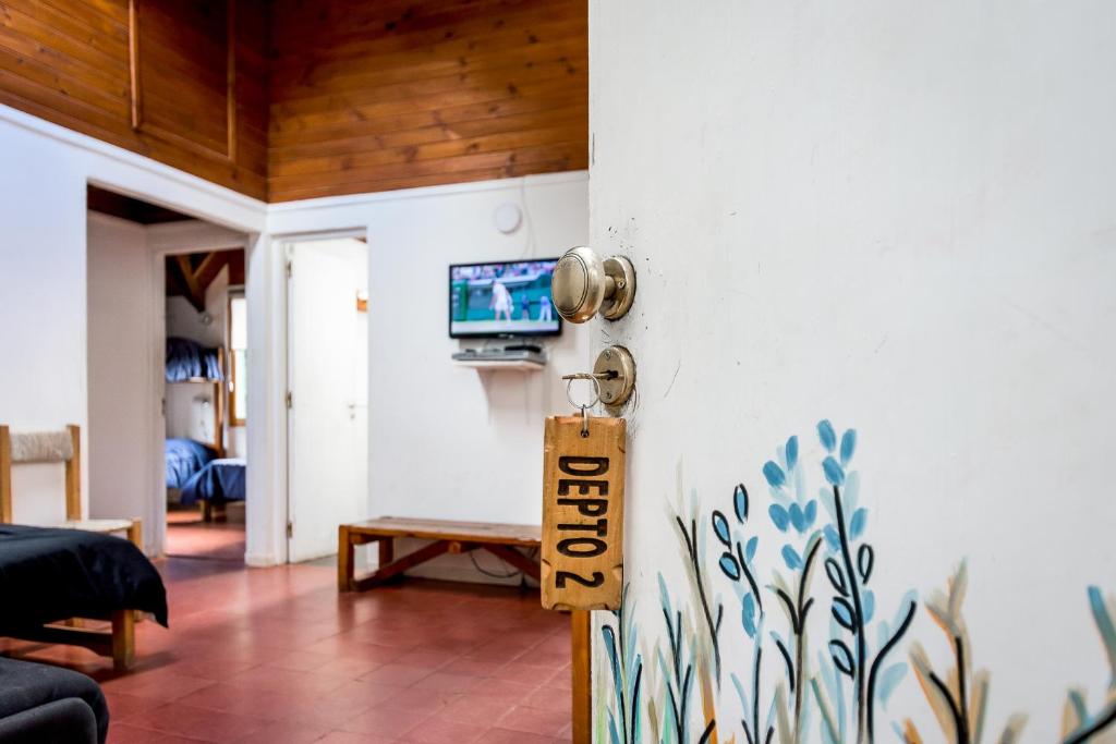 TV a/nebo společenská místnost v ubytování Hostel La Angostura
