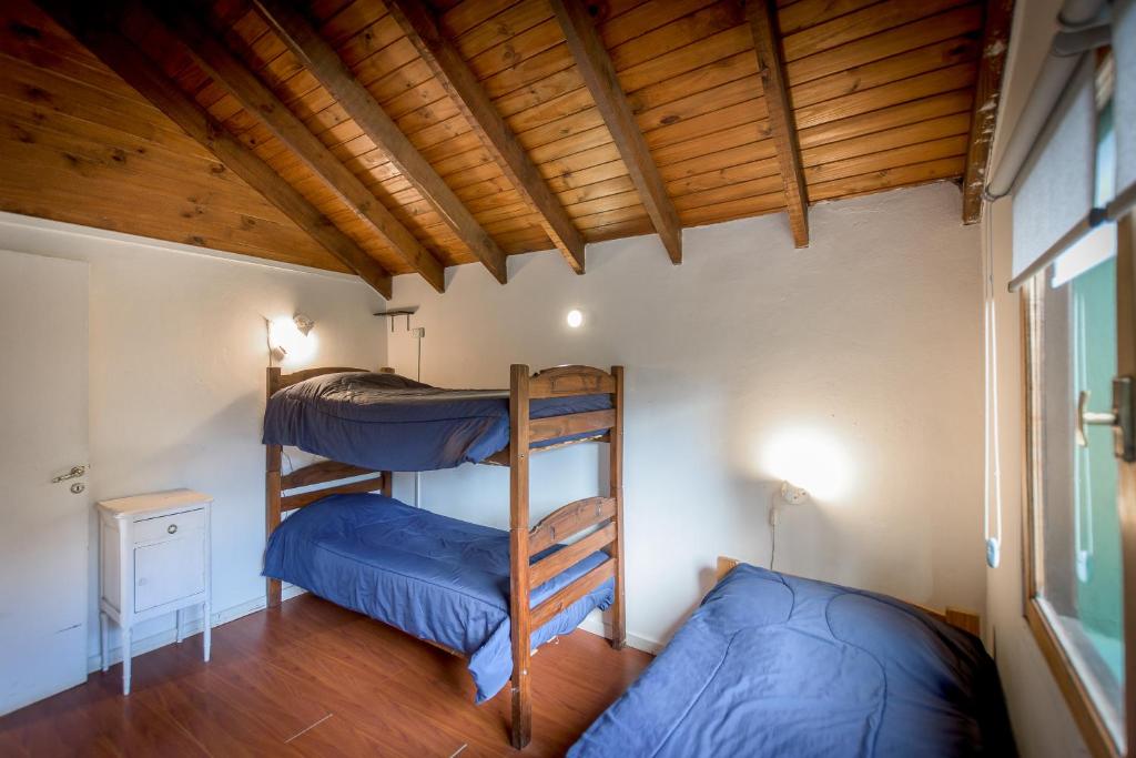 Postel nebo postele na pokoji v ubytování Hostel La Angostura