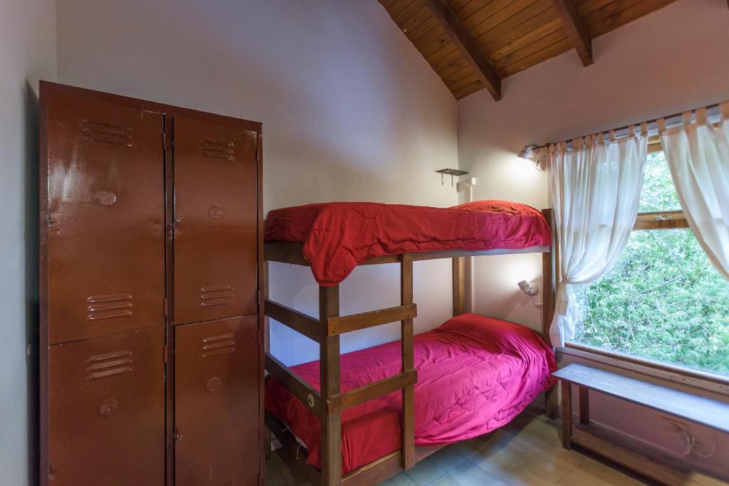 Postel nebo postele na pokoji v ubytování Hostel La Angostura