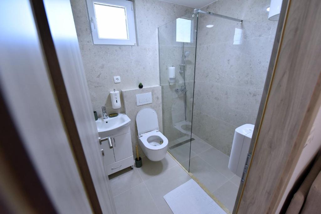 Koupelna v ubytování Airport Apartments TRI HRASTA