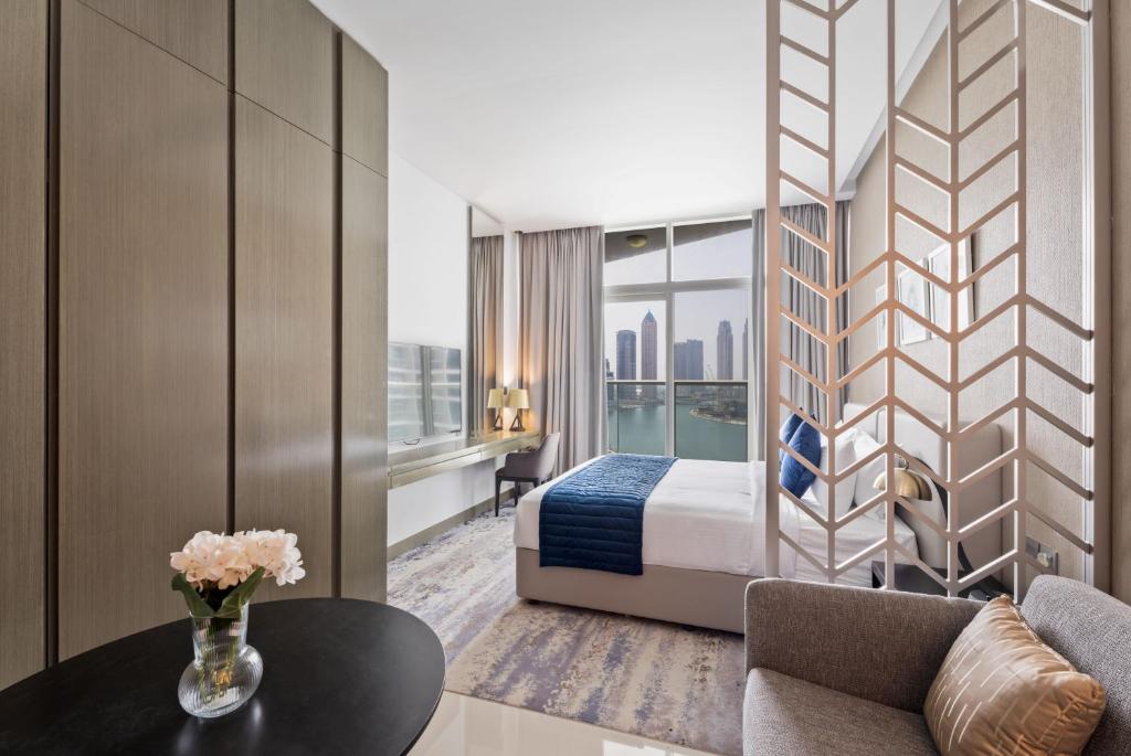 Posezení v ubytování Aliving Stylish Studio at DAMAC Prive with Balcony and Partial Burj Khalifa View-1315