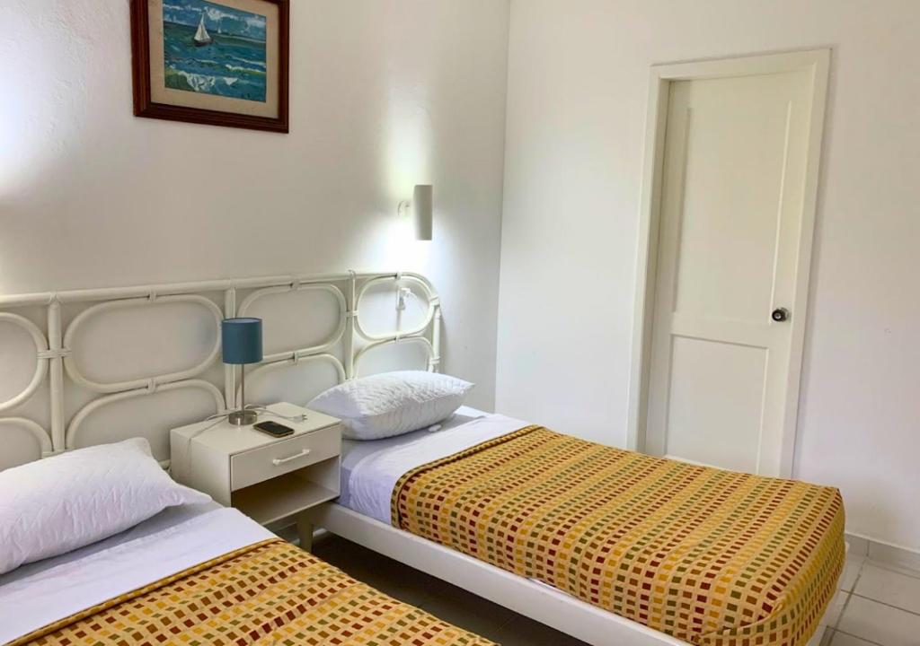 Postel nebo postele na pokoji v ubytování Hermosa Casa de 3 pisos