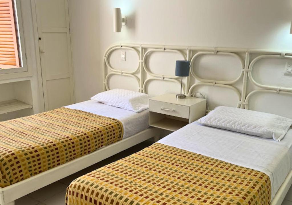 Postel nebo postele na pokoji v ubytování Hermosa Casa de 3 pisos