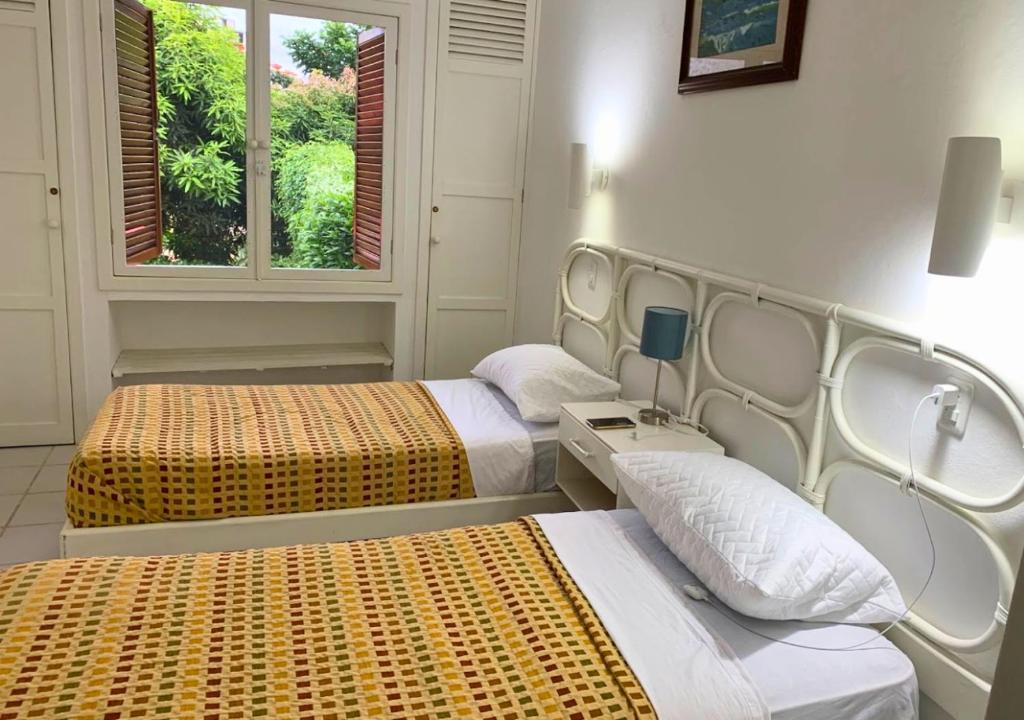 Postel nebo postele na pokoji v ubytování Hermosa Casa de 3 pisos