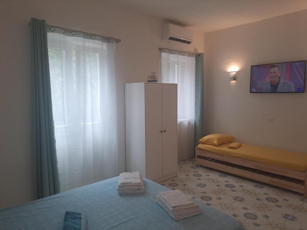 Postel nebo postele na pokoji v ubytování Citronia Relax