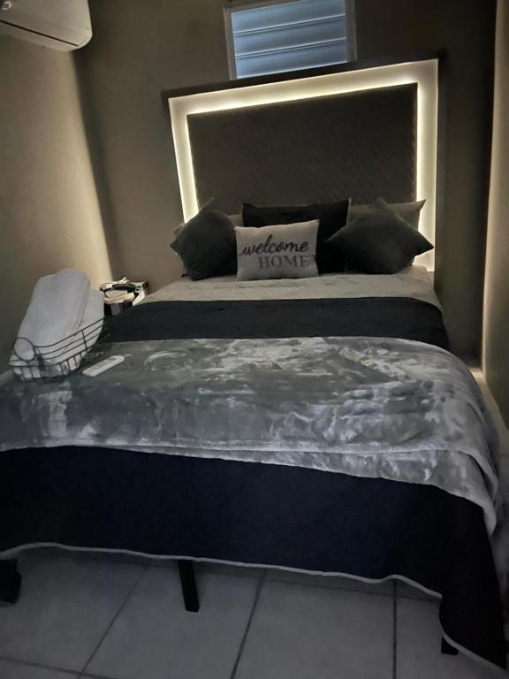 Postel nebo postele na pokoji v ubytování Dreamscape