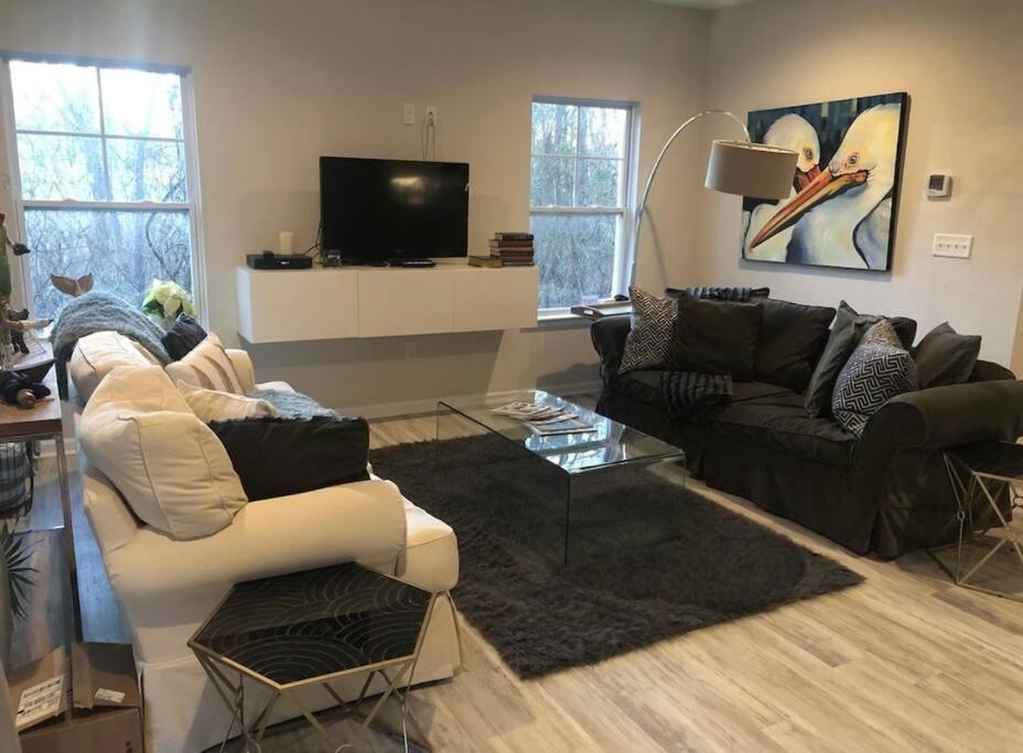 a living room with two couches and a tv at Cozy Virginia Beach Vacation Home in Virginia Beach