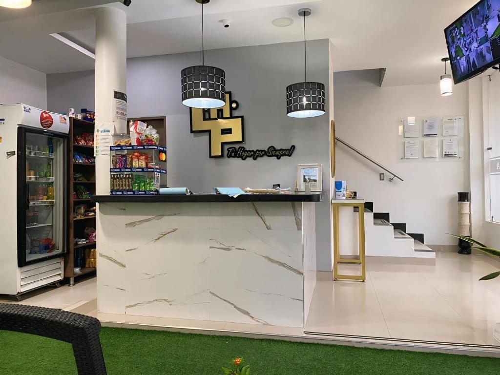 Kuchyň nebo kuchyňský kout v ubytování HOTEL LIGHT PLAZA
