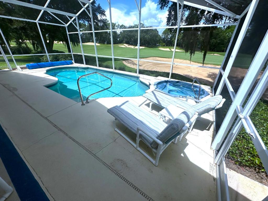 an overhead view of a swimming pool on a boat at Upgraded Pool Villa Spa Southern Dunes in Haines City